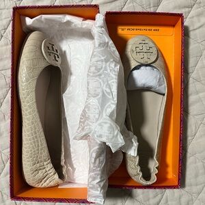 Cream snake skin Tory Burch flats. New in box. Never worn.